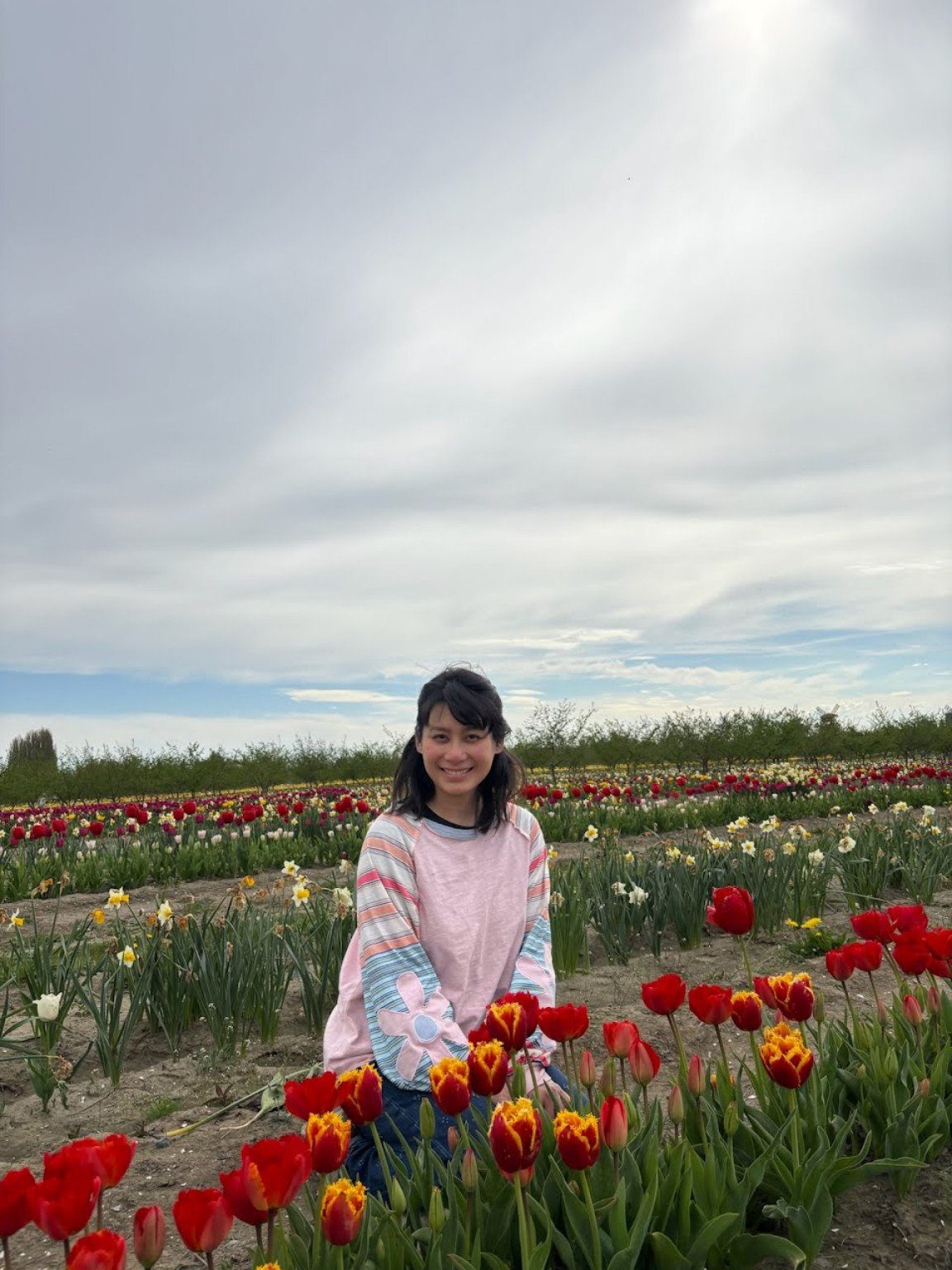 Portrait among the red tulips